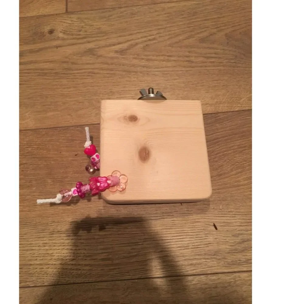 Square wooden bird perch w/ toys